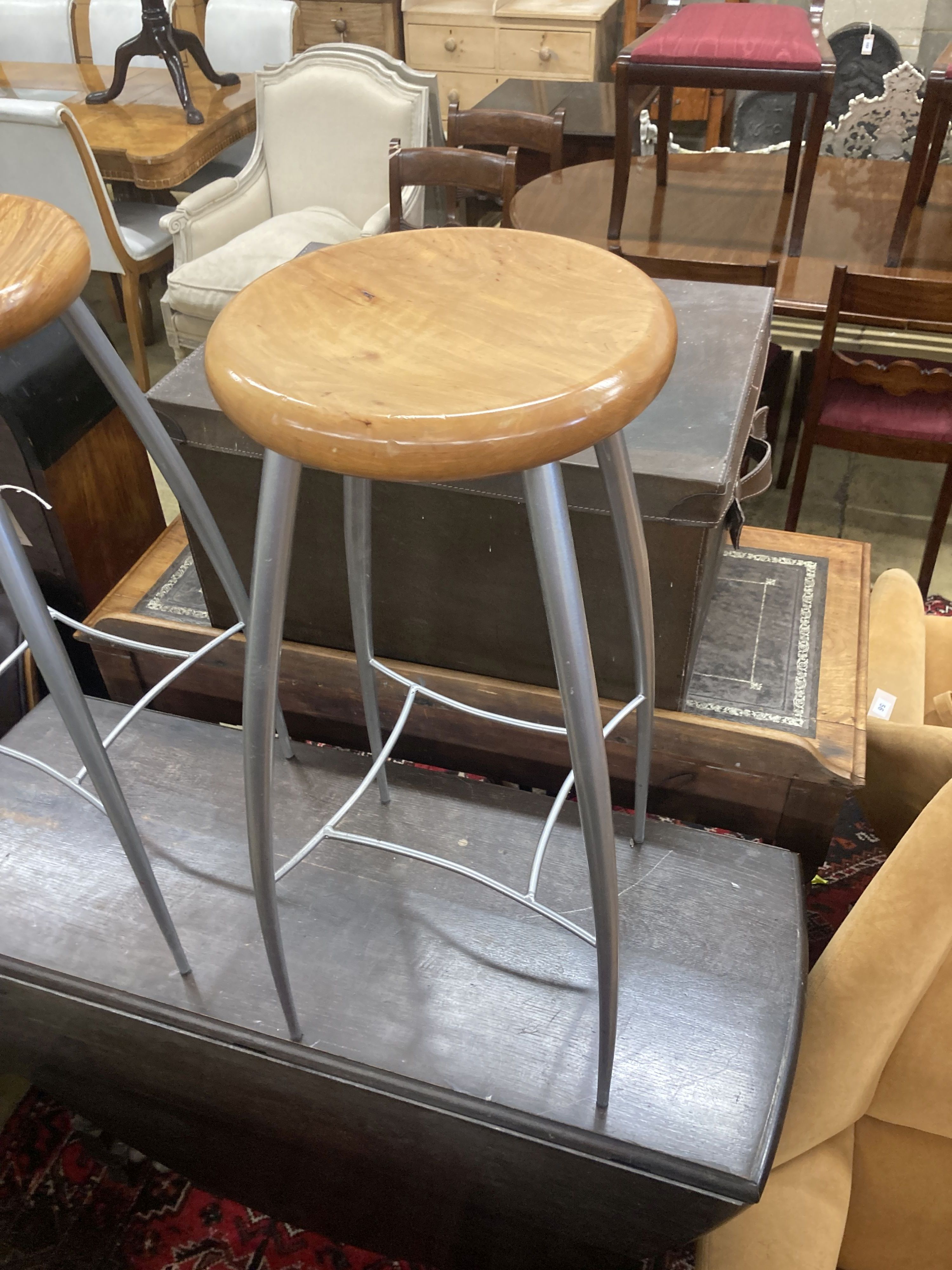 A pair of contemporary silvered metal bar stools, height 73cm